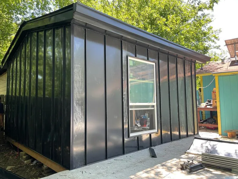 Black standing seam metal wall panels for Roof Inspection in Montrose