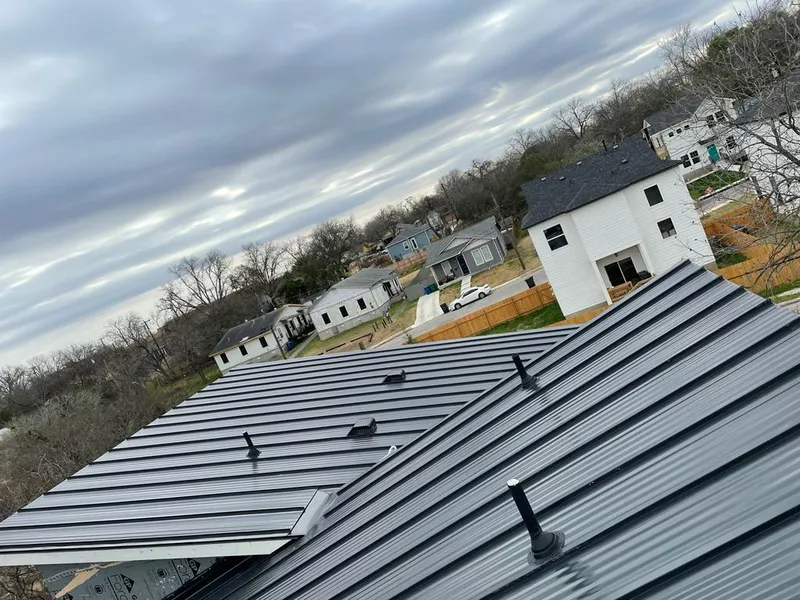 Standing seam metal roof panels with vents for Skylight Repair in Montrose